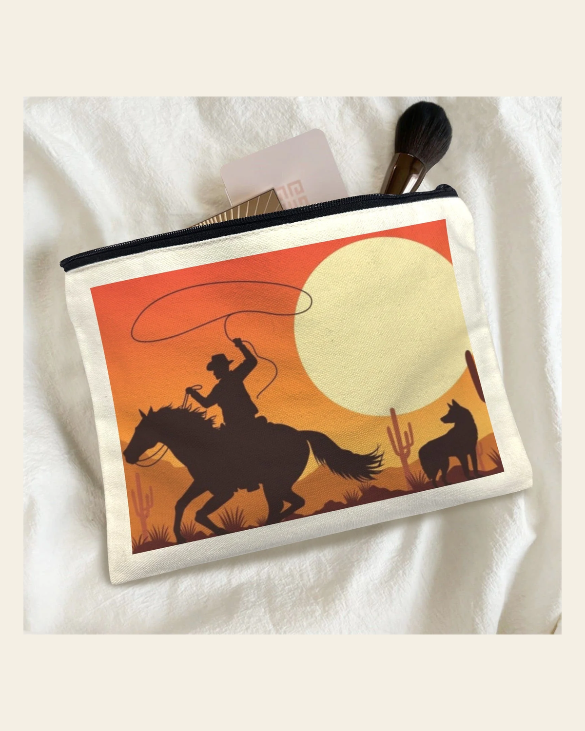 Baha Ranch Cowboy Sunset Cosmetic Bag Pack of 5 Made in America on a warm cream background
