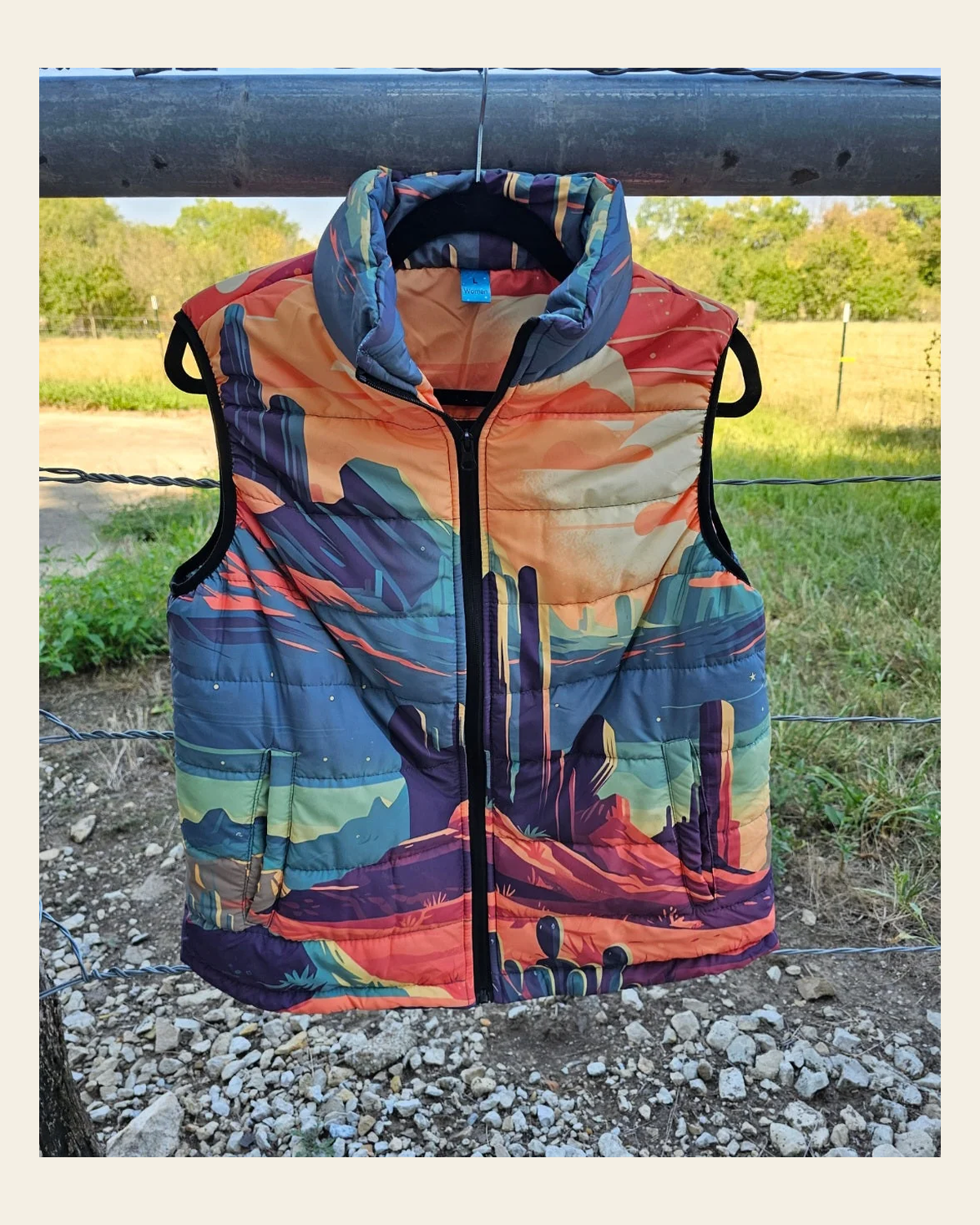 Baha Ranch Desert Canyon Women's Western Puffy Vest on a warm cream background