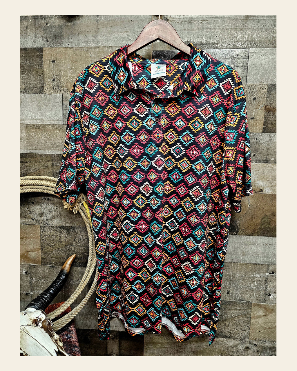 Baha Ranch Diamond Aztec Men's Western Polo Shirt on a warm cream background