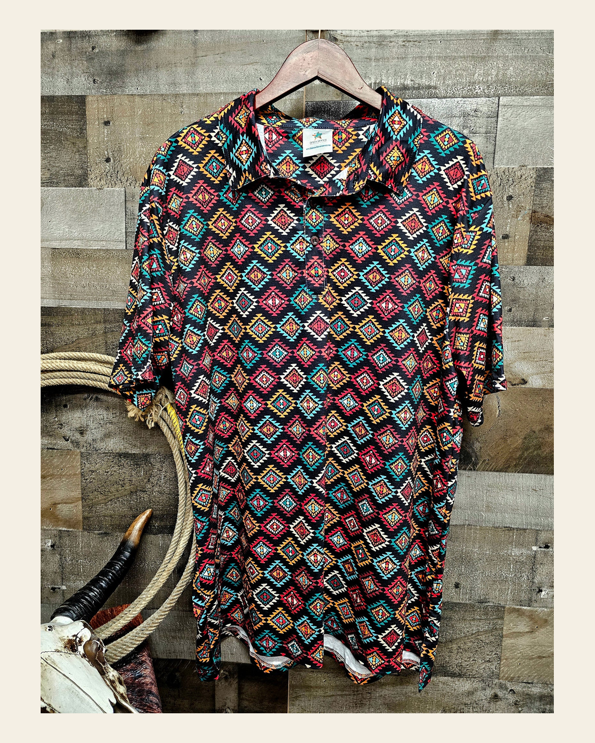 Baha Ranch Diamond Aztec Men's Western Polo Shirt on a warm cream background