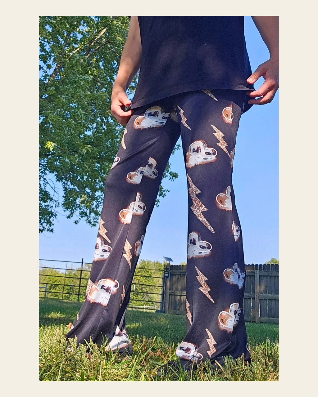 Baha Ranch Disco Cowgirl Flare Pants on a warm cream background