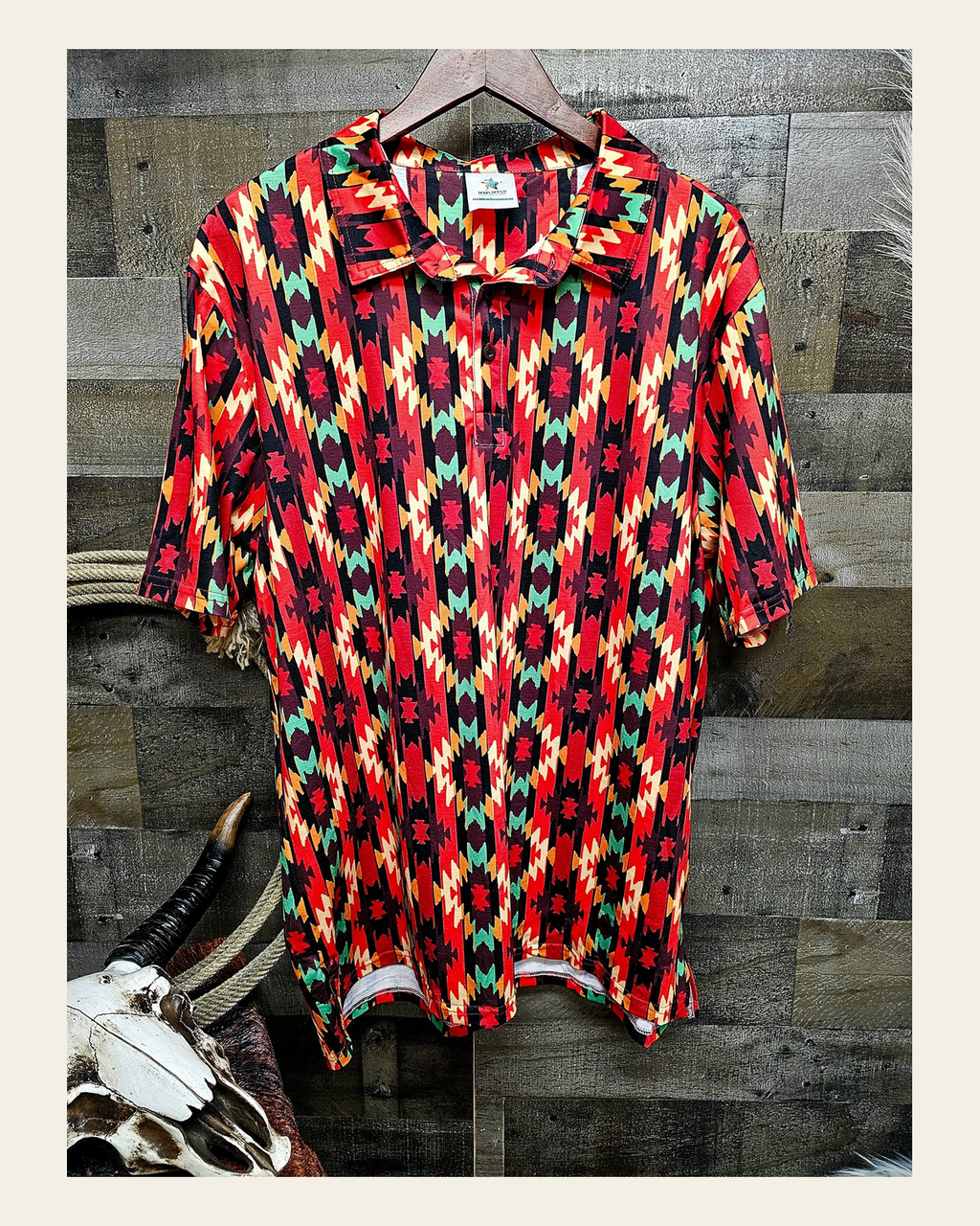 Baha Ranch Fire Aztec Men's Western Polo Shirt on a warm cream background