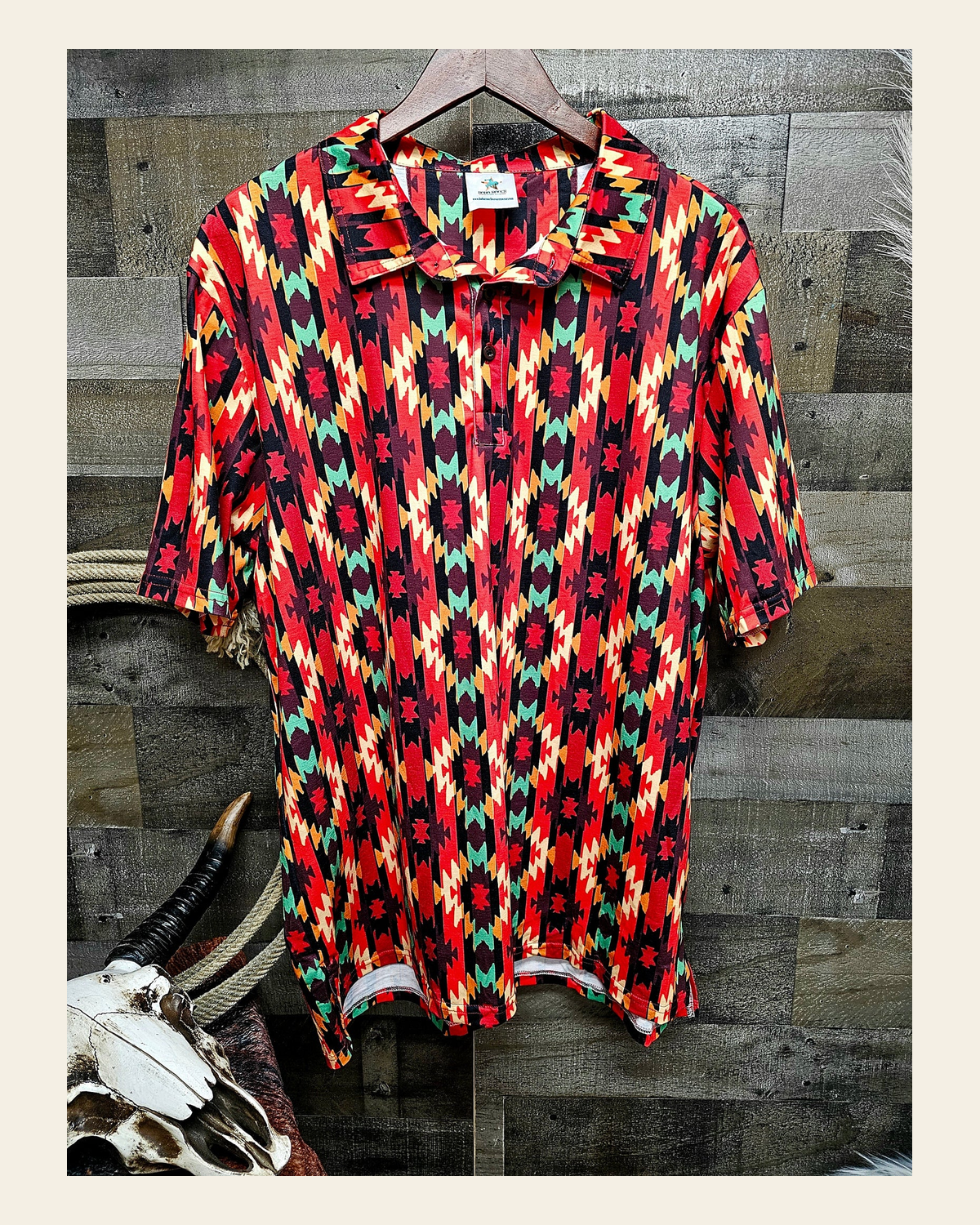 Baha Ranch Fire Aztec Men's Western Polo Shirt on a warm cream background