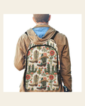 Baha Ranch Floral Boots Cactus Backpack on a warm cream background