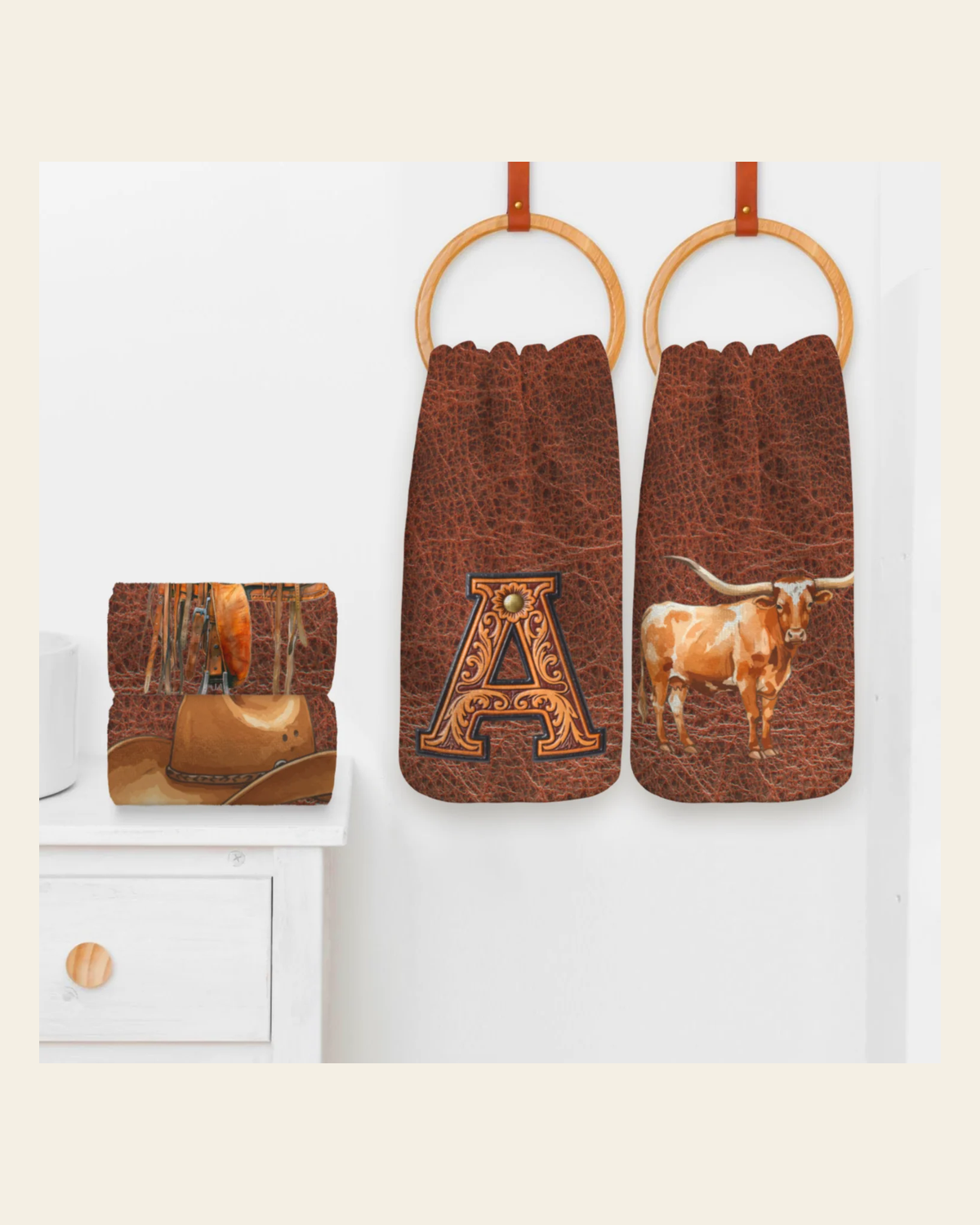 Baha Ranch Monogrammed Initial Western Leather Look Saddle Longhorn Cowboy Cowgirl Kitchen Dish Towels Made in America on a warm cream background