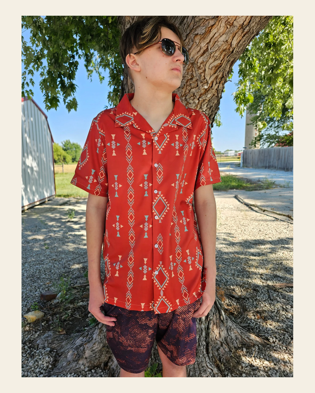 Baha Ranch Rust Aztec Men's Western Camp Shirt on a warm cream background