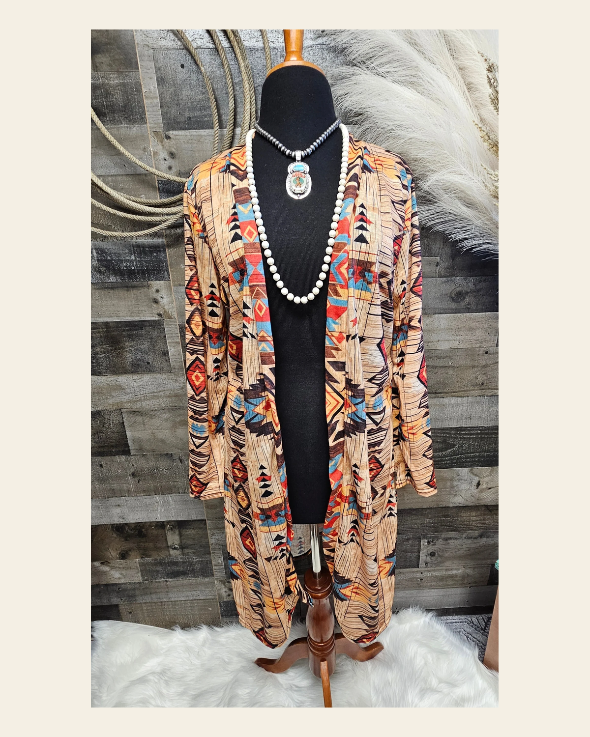 Baha Ranch Sahara Aztec Lightweight Cardigan on a warm cream background