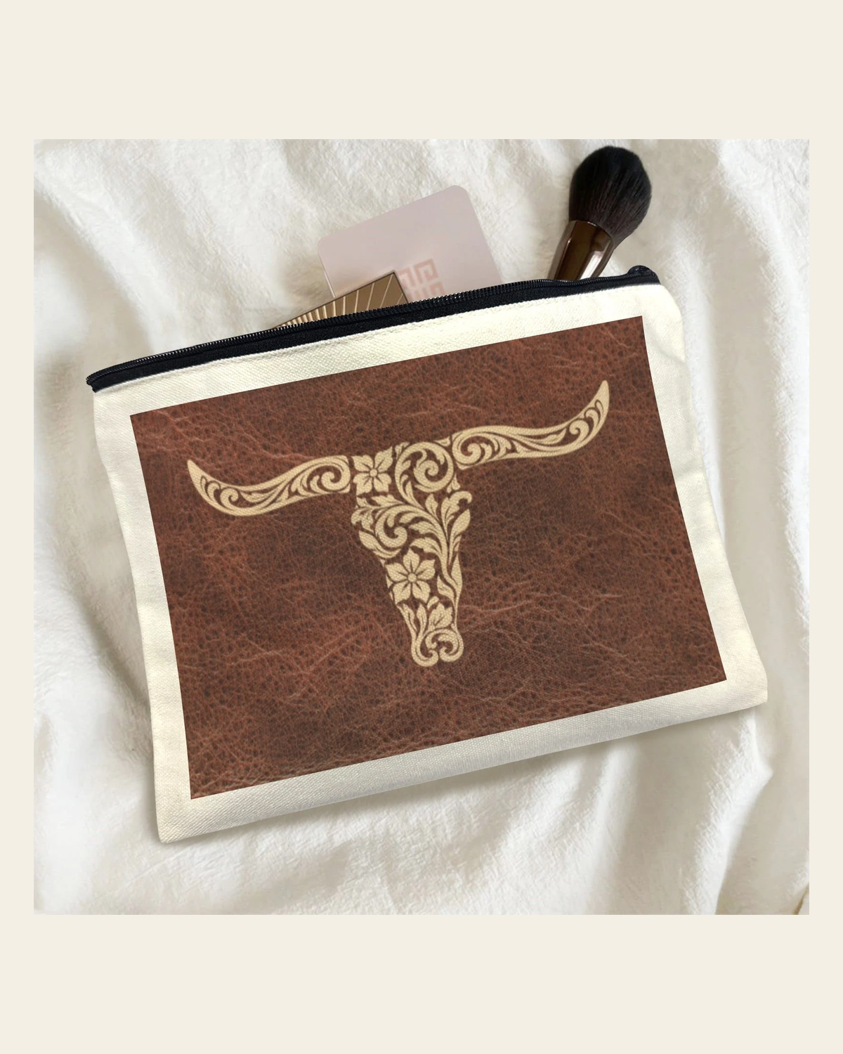 Baha Ranch Tooled Longhorn Set of 5 bags Cosmetic Bag Made in America on a warm cream background