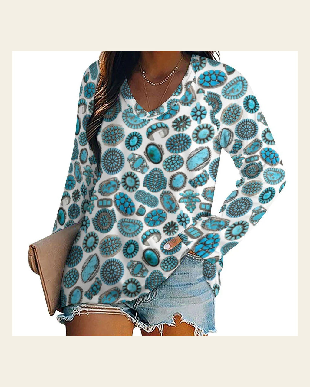 Baha Ranch Turquoise Crazy Long Sleeve Top on a warm cream background