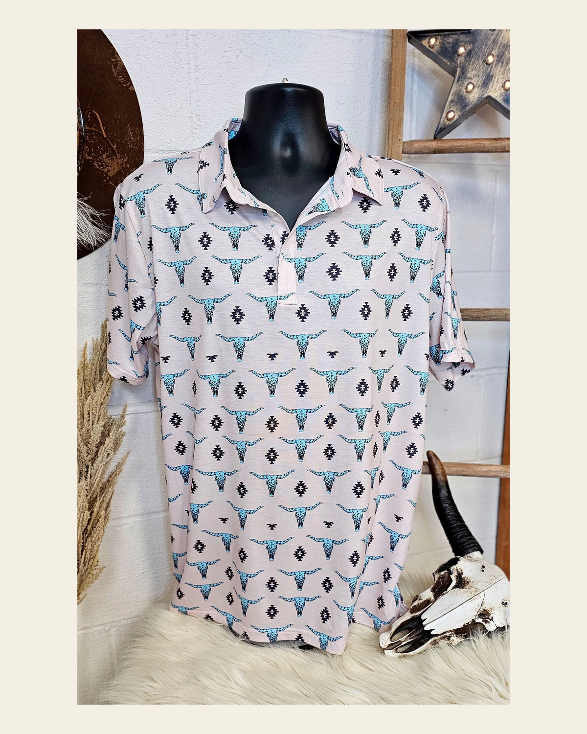 Baha Ranch Turquoise Longhorn Polo Style Shirt on a warm cream background