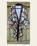Baha Ranch Vintage Cowboy Collage Satin Kimono Robe on a warm cream background