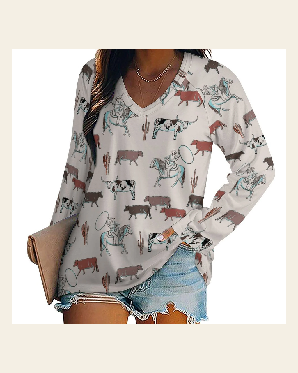Baha Ranch Western Cow Cattle Long Sleeve Top on a warm cream background