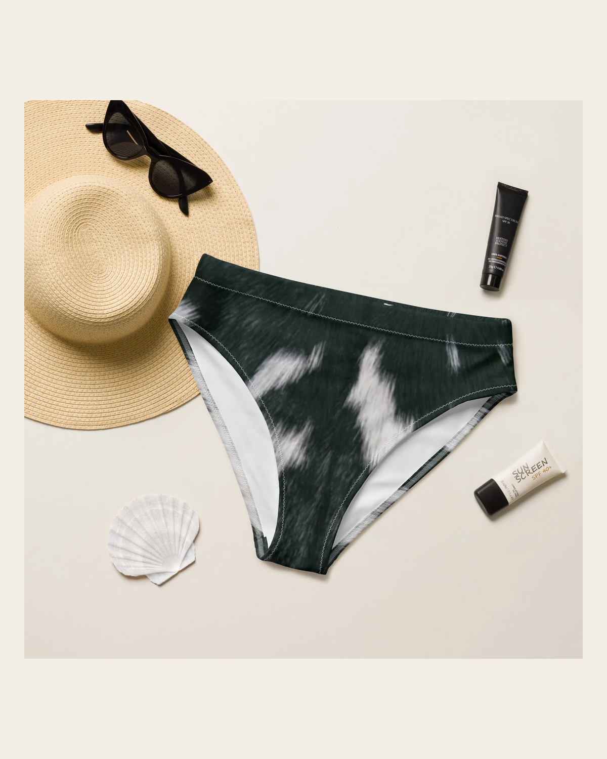 Baha Ranch Yeehaw Cow Print Bikini Bottom on a warm cream background