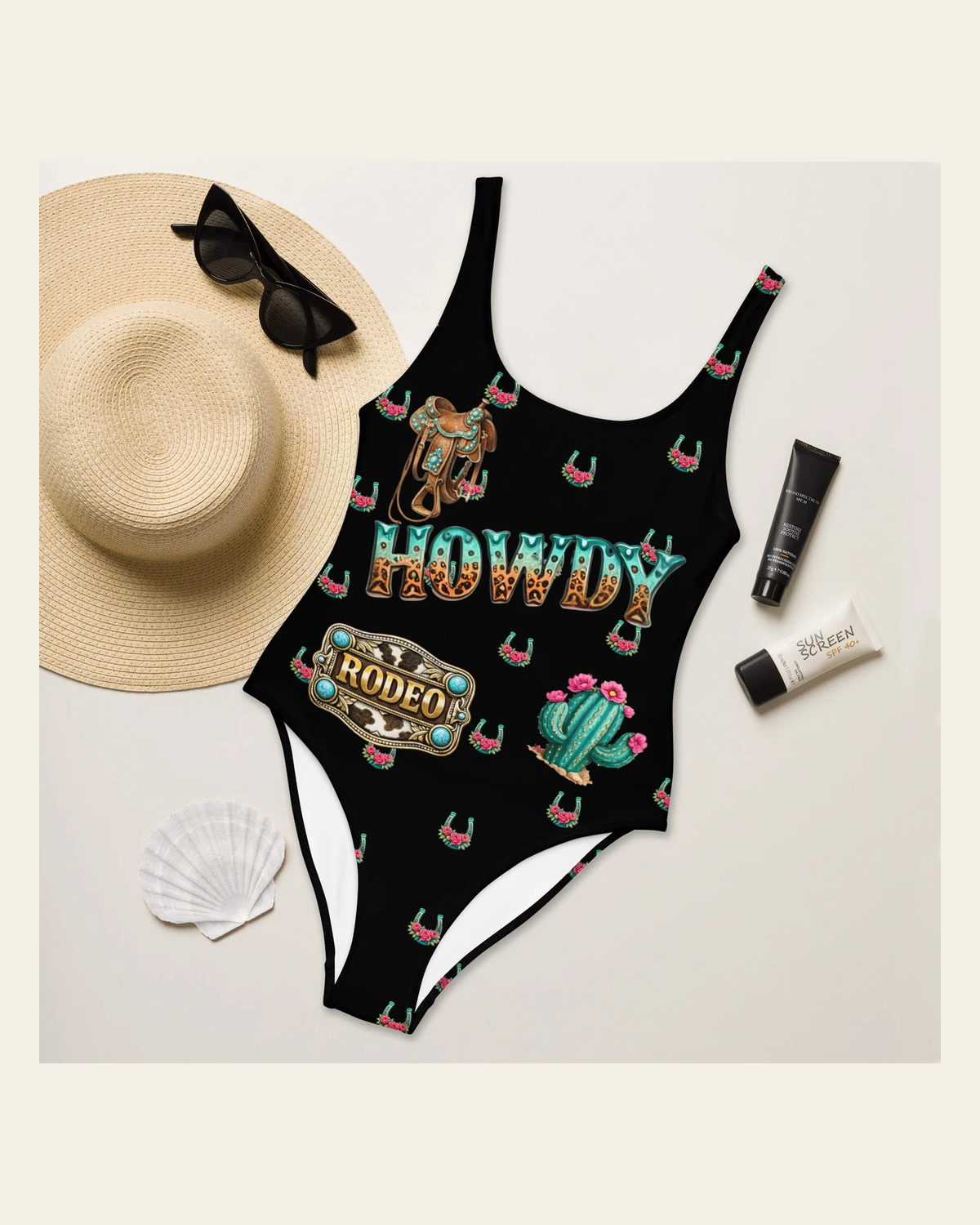 Baha Ranch Yeehaw Howdy Y'all One-Piece Swimsuit on a warm cream background