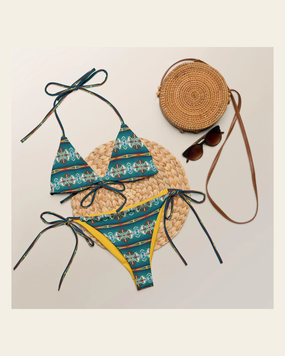 Baha Ranch Yeehaw Teal Aztec String Bikini on a warm cream background