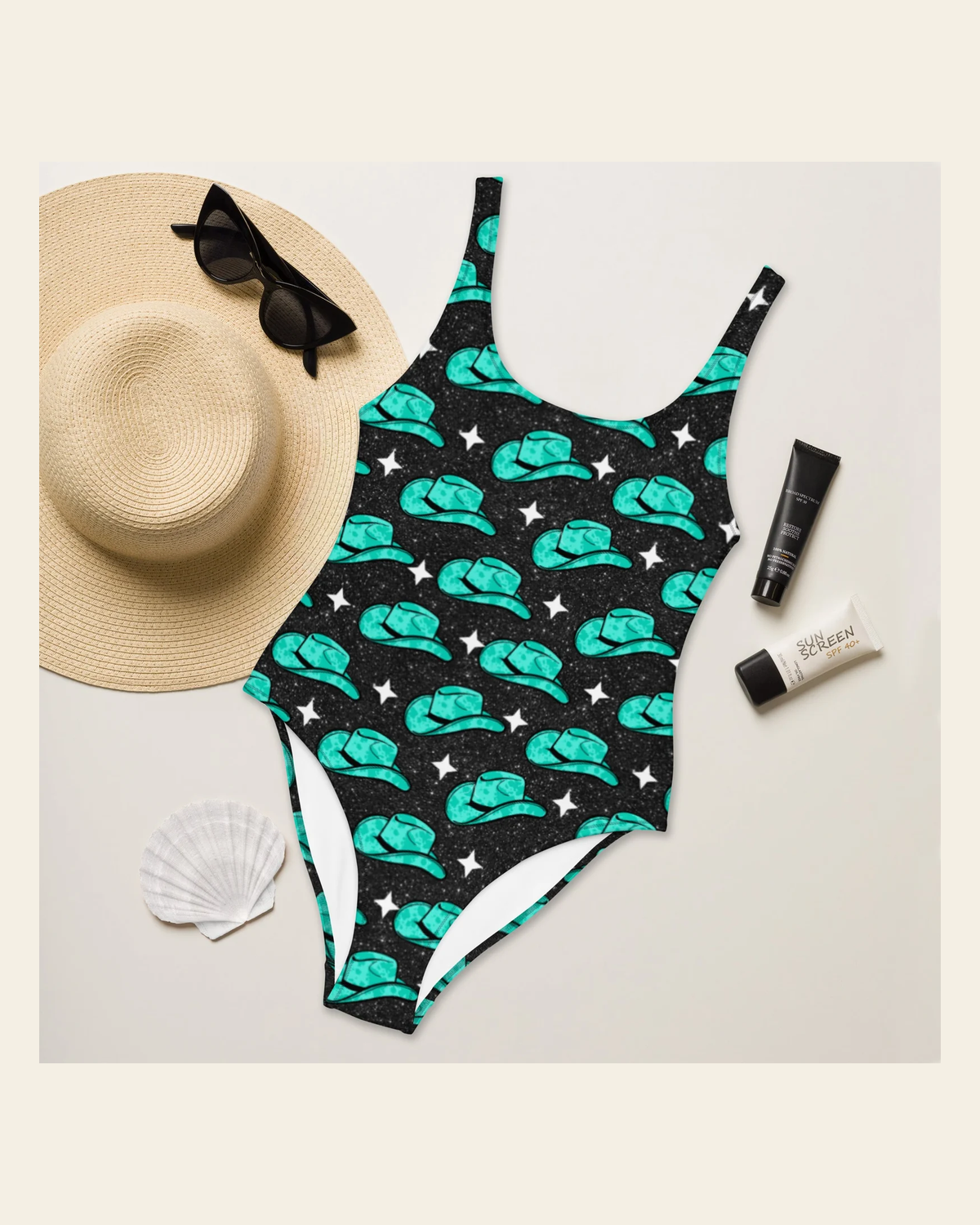 Baha Ranch Yeehaw Turquoise Hat One-Piece Swimsuit on a warm cream background