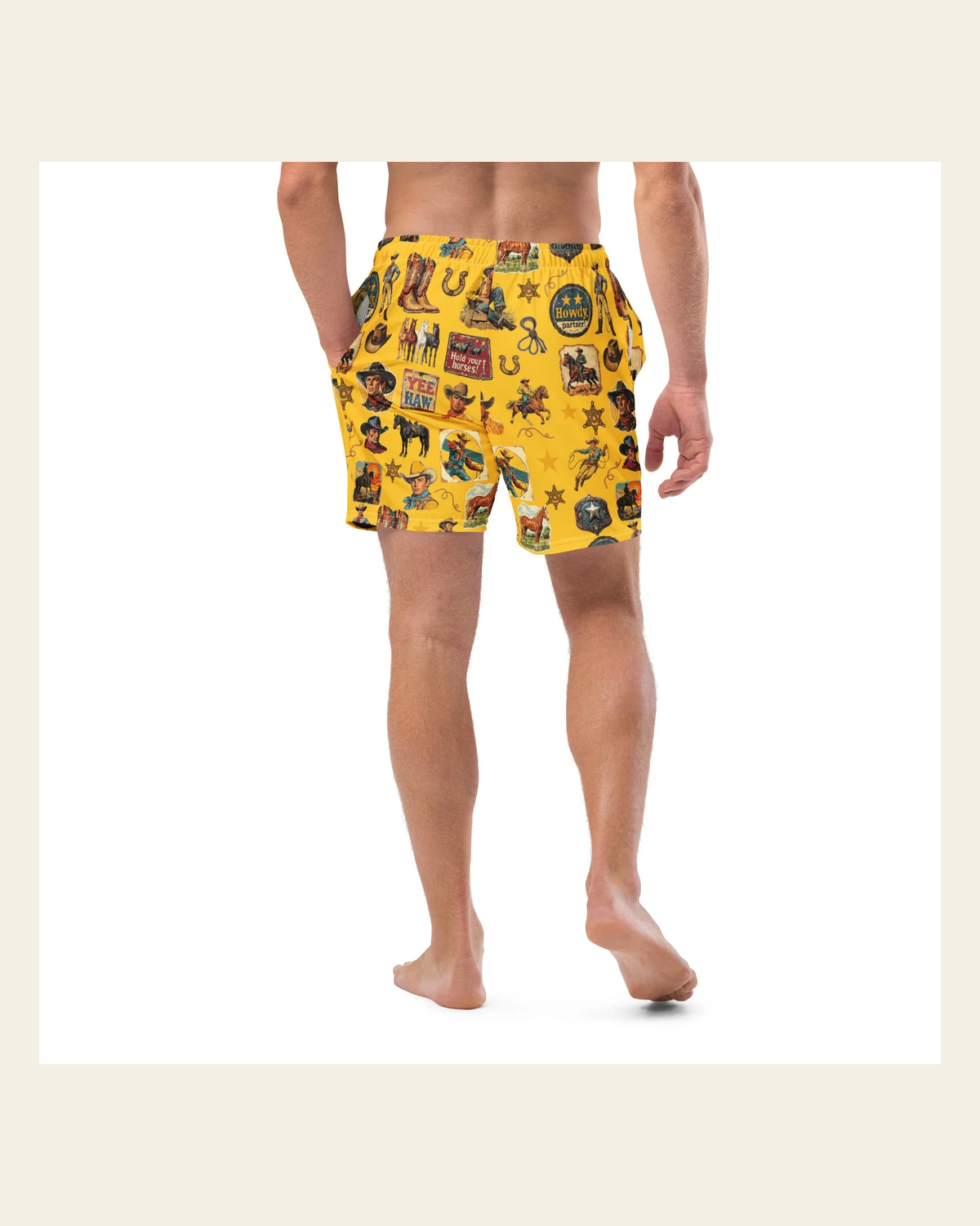 Baha Ranch YEEHAW Vintage Cowboy Collage Western Swim Trunks Shorts on a warm cream background