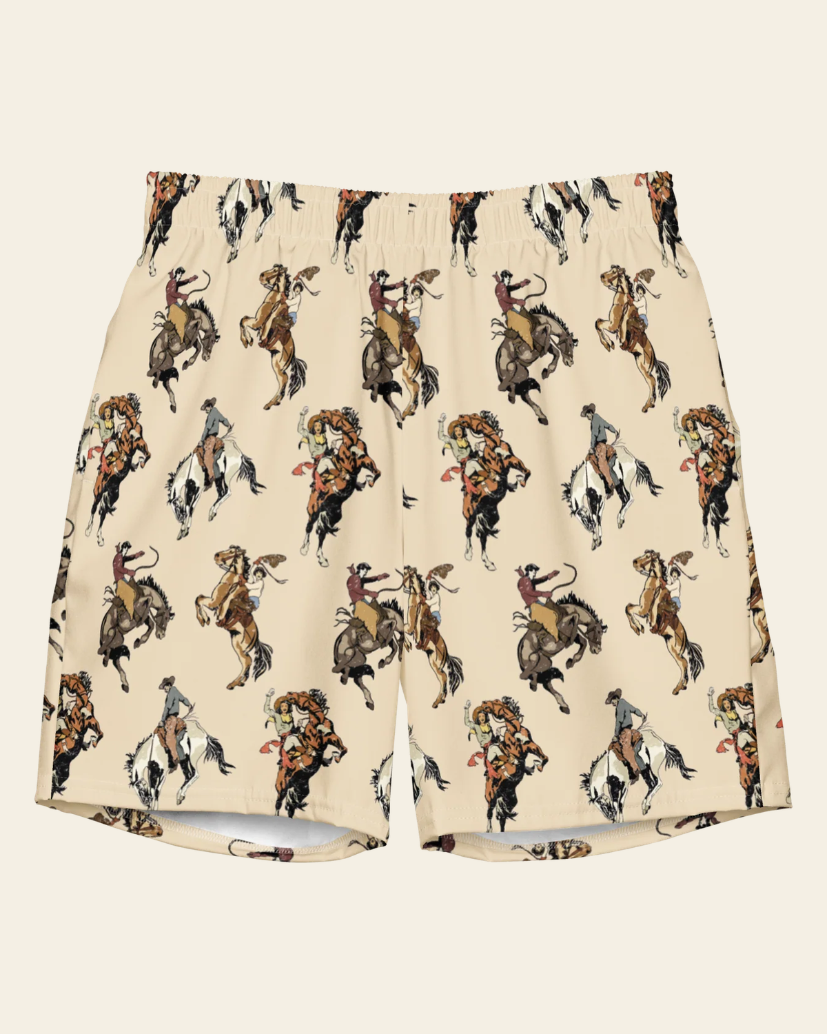 Baha Ranch Yeehaw Vintage Cowgirl Men's Swim Trunks on a warm cream background