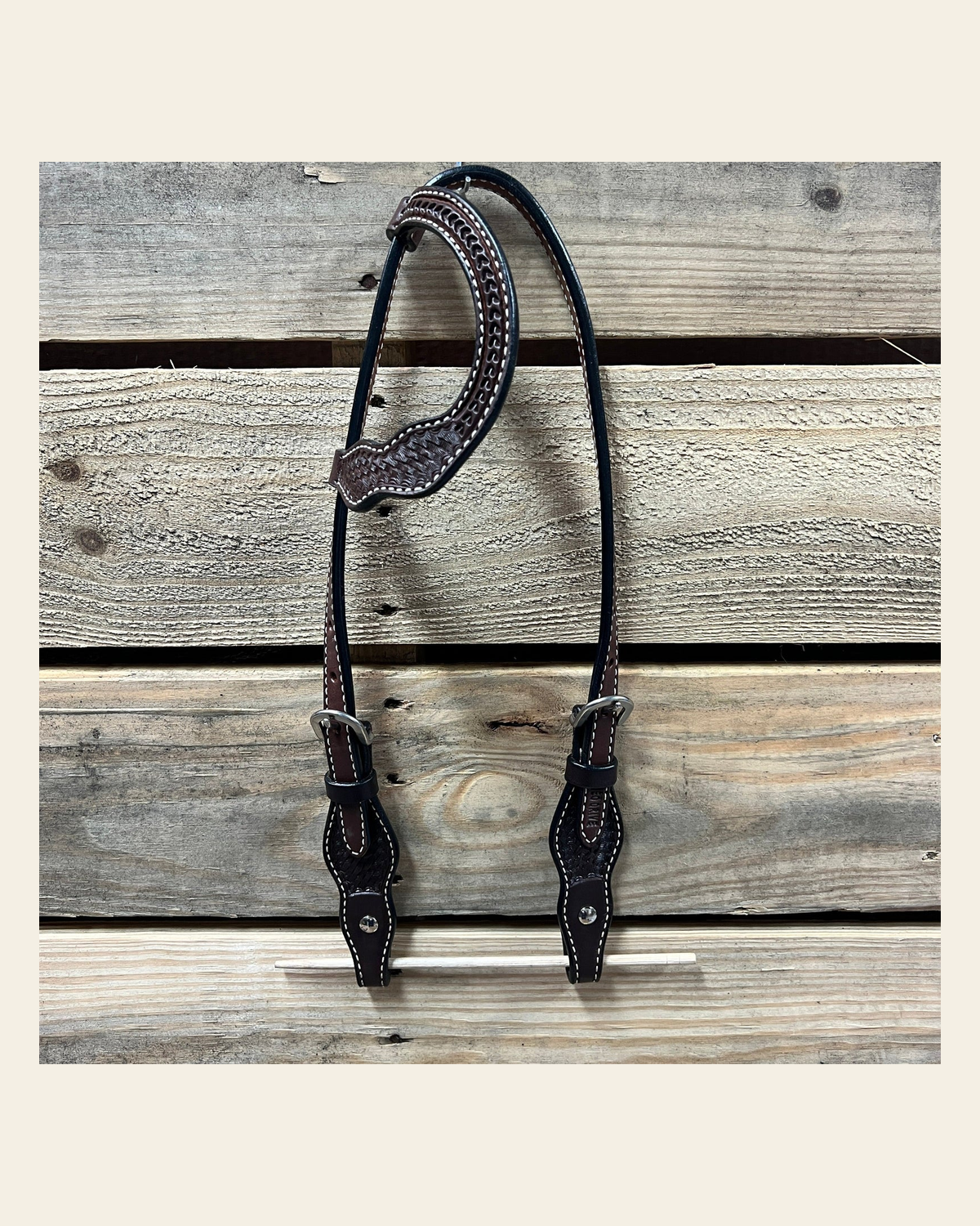Dark Oil Cob - Gag One Ear Headstall / Bridle- Short Cheeks on a warm cream background