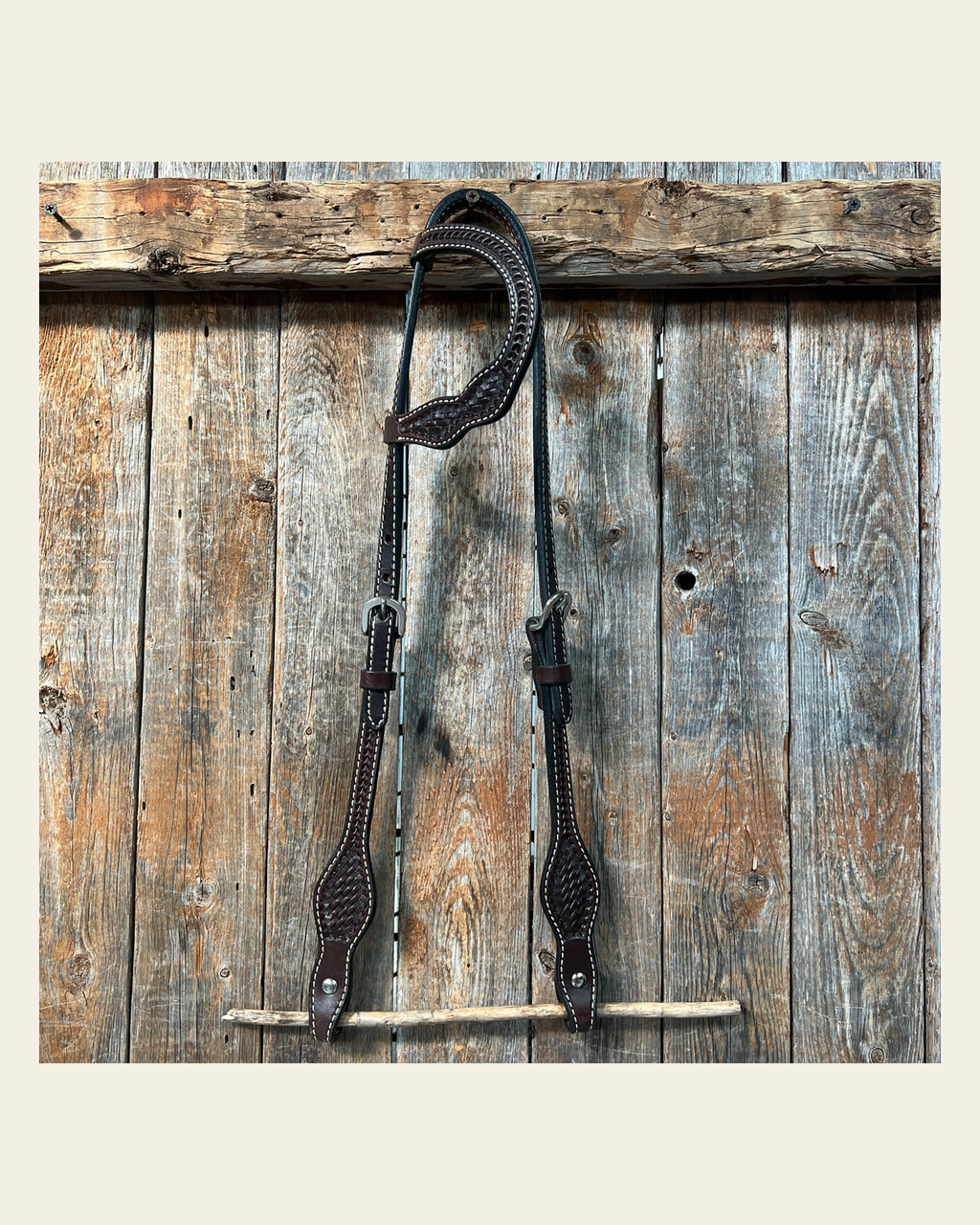Basketweave Dark Oil One Ear Headstall / Bridle on a warm cream background