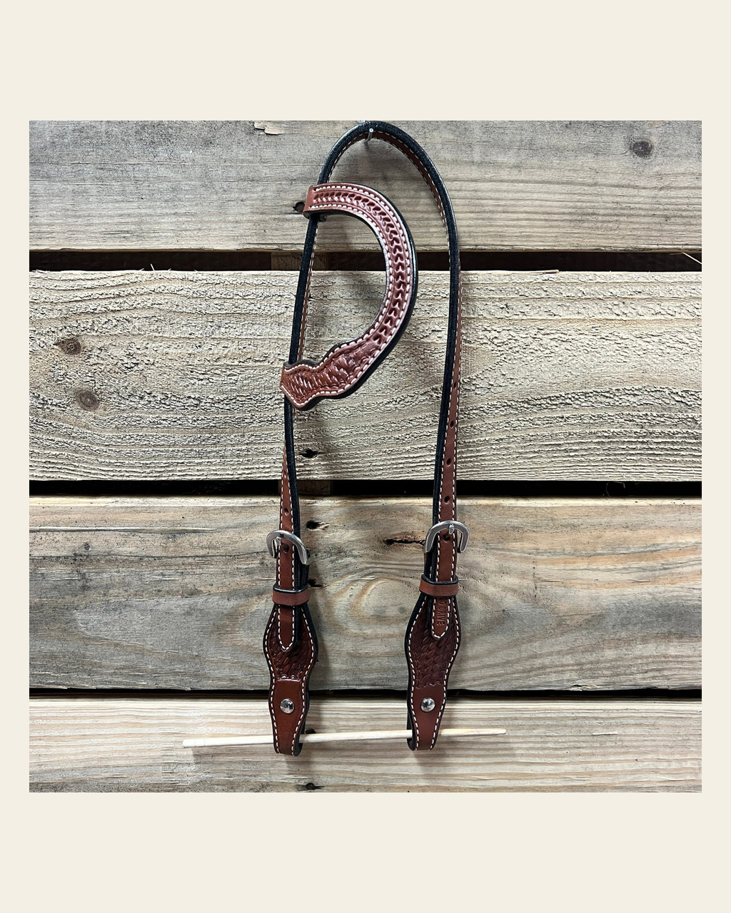 Medium Oil Cob - Gag One Ear Headstall / Bridle- Short Cheeks on a warm cream background