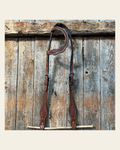 Basketweave Medium Oil One Ear Headstall / Bridle on a warm cream background