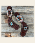Basketweave Spur Straps - Copper Conchos #SS104 on a warm cream background