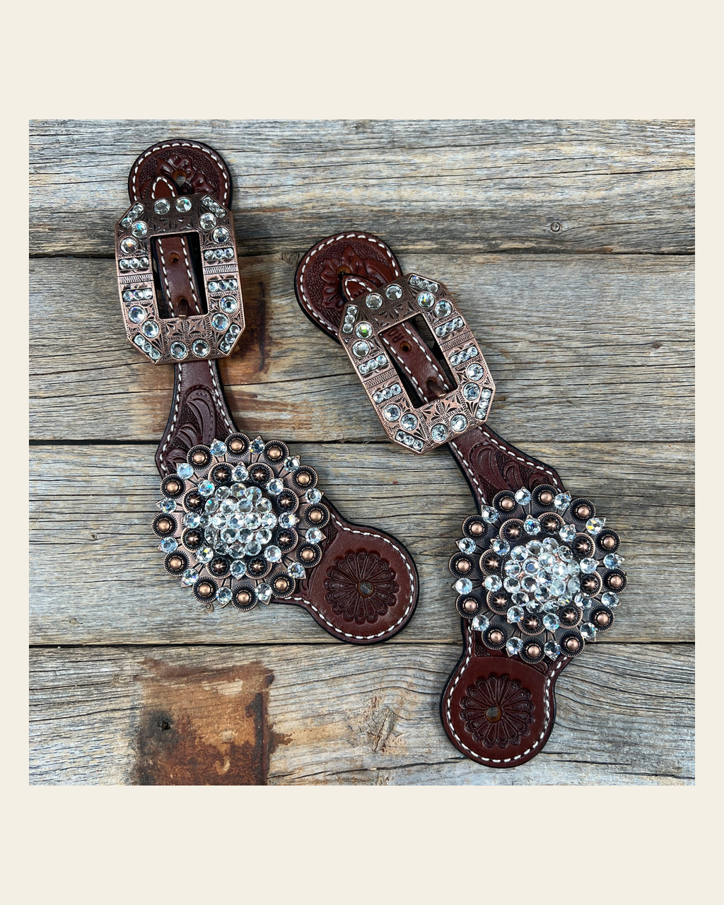 Floral Spur Straps - Copper Conchos #SS105 on a warm cream background