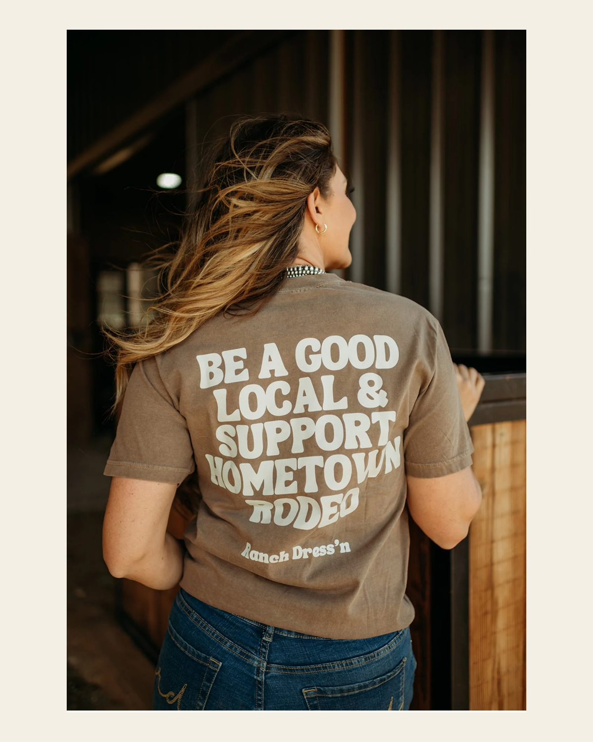 Be A Good Local And Support Hometown Rodeo Tee on a warm cream background