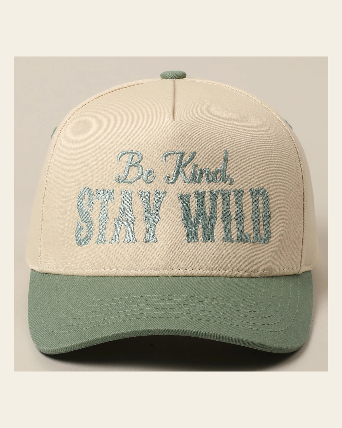 Be Kind Stay Wild Trucker | Cap on a warm cream background