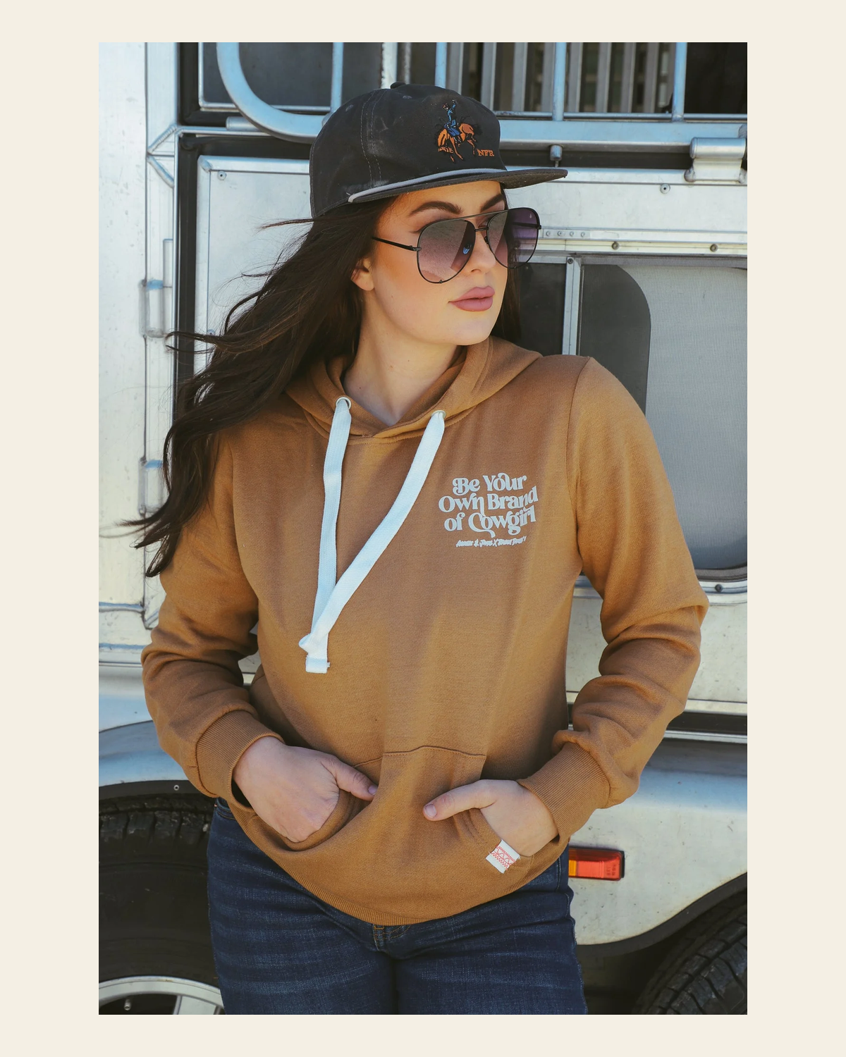Be Your Own Brand Of Cowgirl Camel Hoodie on a warm cream background