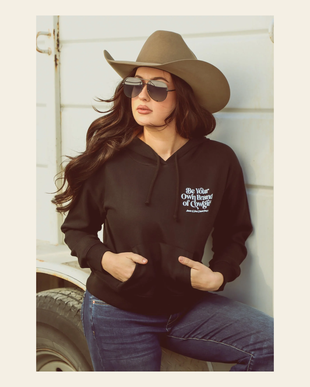 Be Your Own Brand Of Cowgirl Cropped Hoodie on a warm cream background