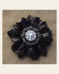 Black Carnation Flower With Antique Silver AB 1" Concho on a warm cream background