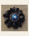 Black Carnation Flower With Antique Silver Capri and AB 1" Concho on a warm cream background