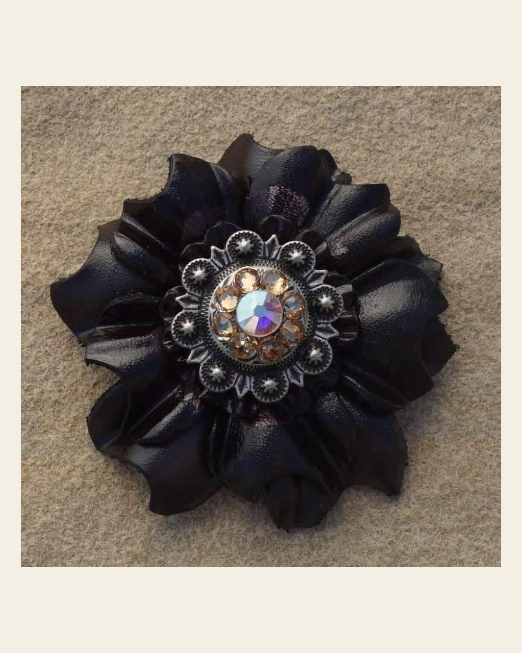 Black Carnation Flower With Antique Silver Champagne & AB 1" Concho on a warm cream background