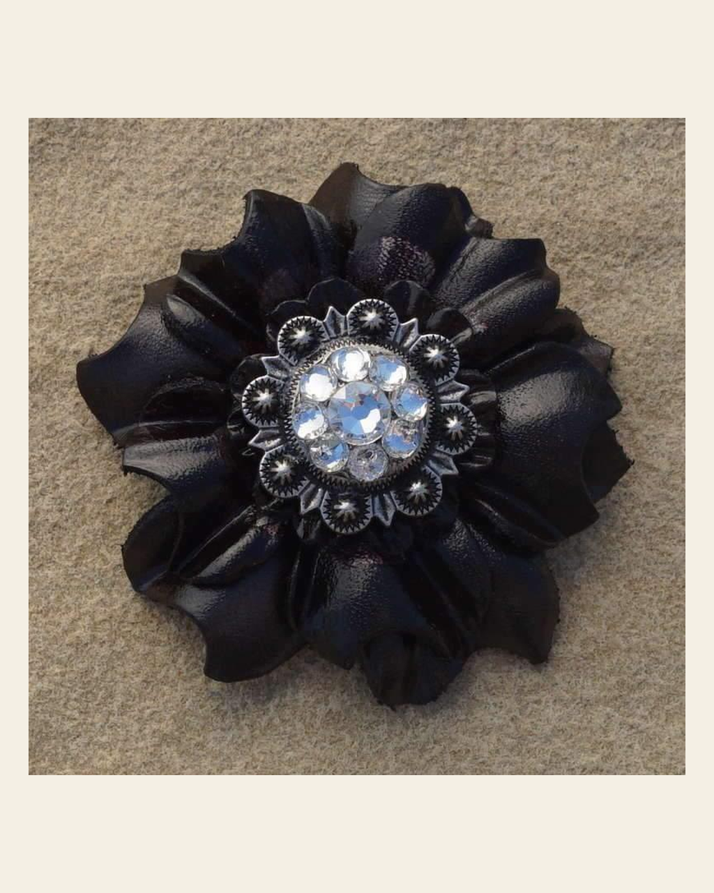 Black Carnation Flower With Antique Silver Clear 1" Concho on a warm cream background