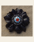 Black Carnation Flower With Antique Silver Fire Opal and Aqua 1" Concho on a warm cream background