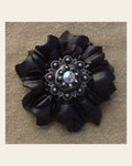 Black Carnation Flower With Antique Silver Jet and AB 1" Concho on a warm cream background