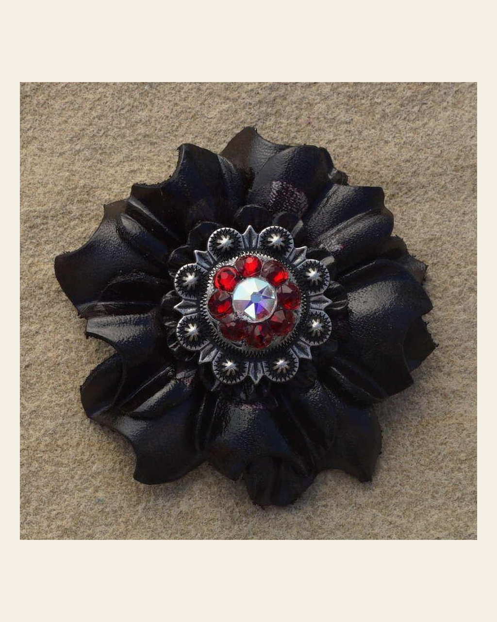 Black Carnation Flower With Antique Silver Ruby and AB 1" Concho on a warm cream background
