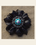 Black Carnation Flower With Antique Silver Teal and AB 1" Concho on a warm cream background
