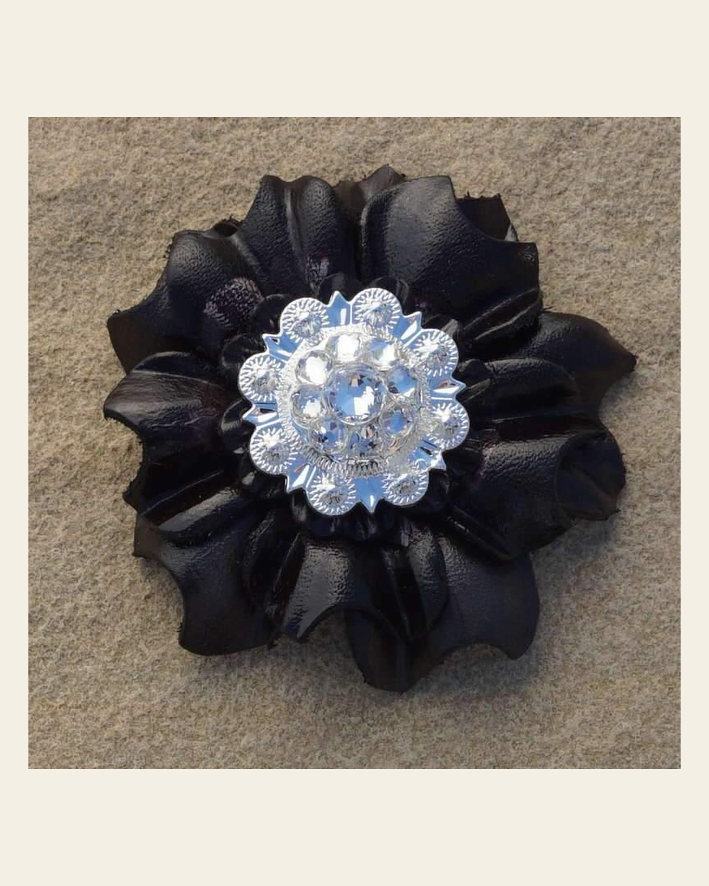Black Carnation Flower With Bright Silver Clear 1" Concho on a warm cream background