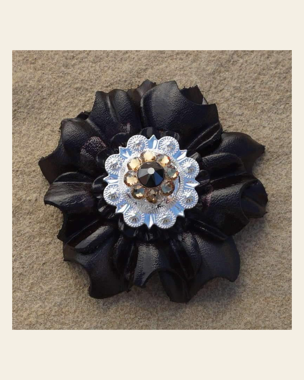 Black Carnation Flower With Bright Silver Jet & Champagne 1" Concho on a warm cream background