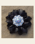Black Carnation Flower With Bright Silver Light Sapphire and AB 1" Concho on a warm cream background