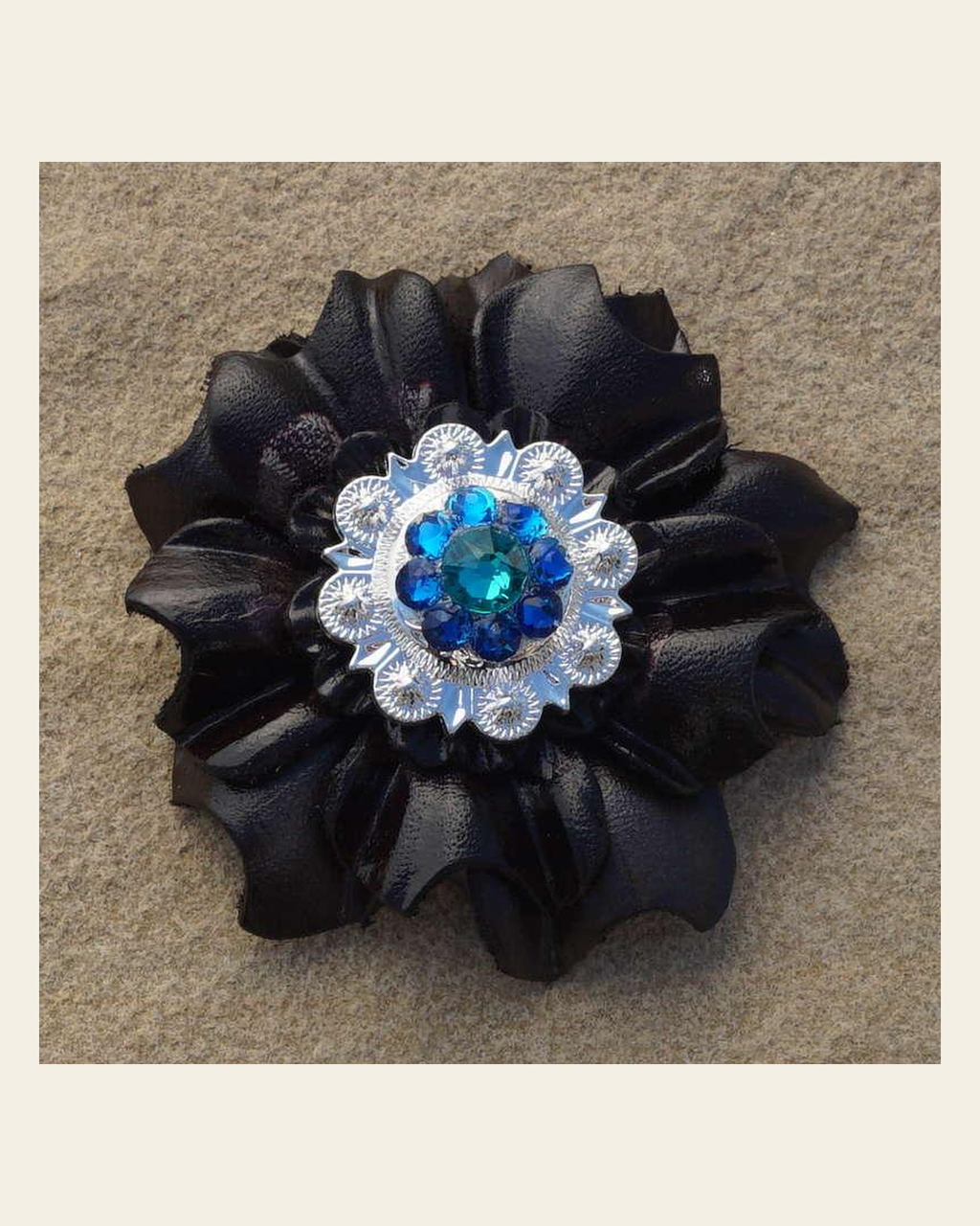 Black Carnation Flower With Bright Silver Teal and Capri 1" Concho on a warm cream background
