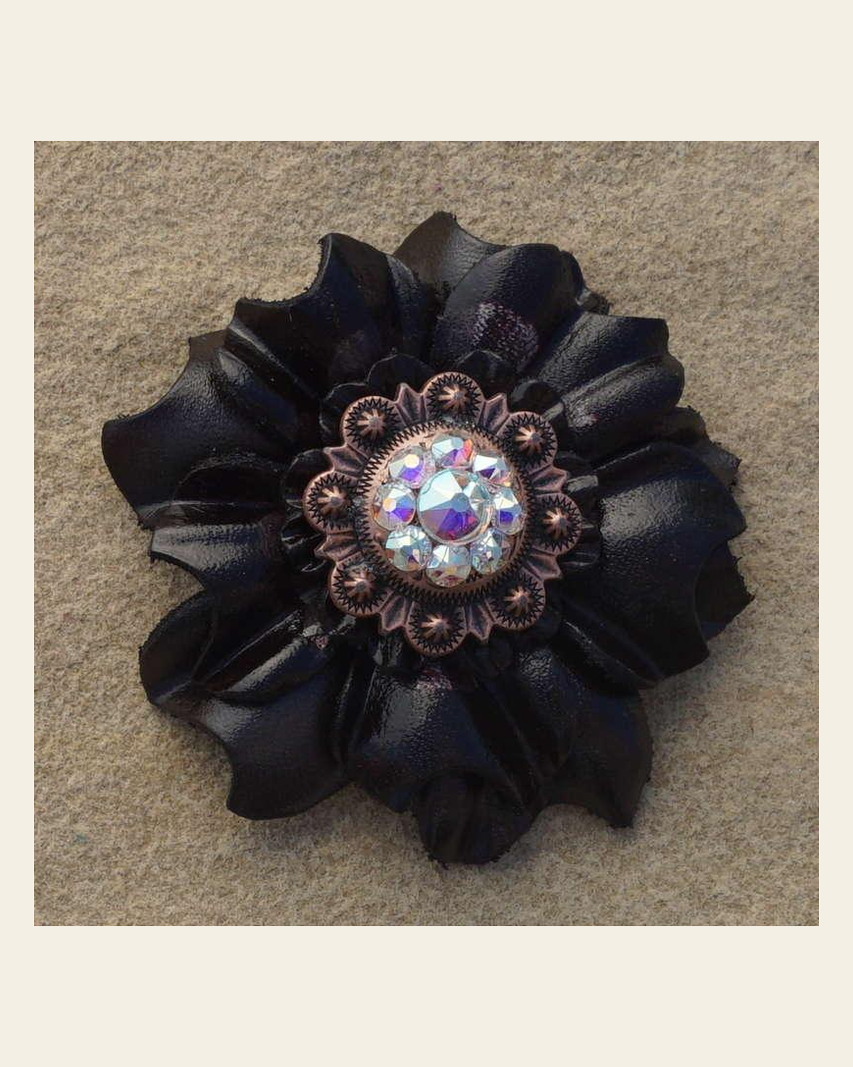 Black Carnation Flower With Copper AB 1" Concho on a warm cream background
