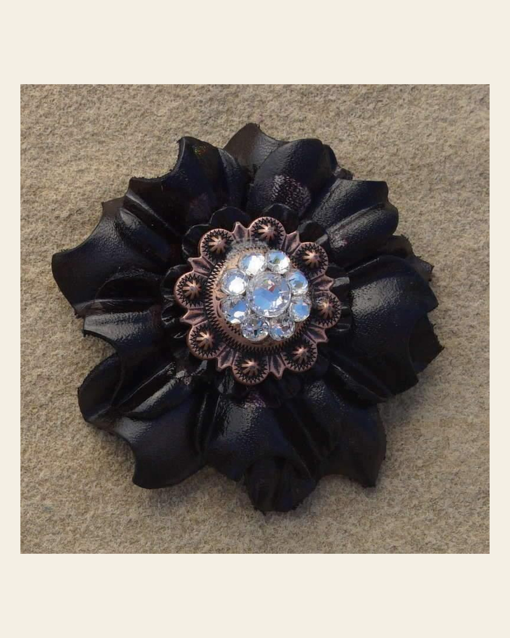 Black Carnation Flower With Copper Clear 1" Concho on a warm cream background