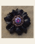 Black Carnation Flower With Copper Fuchsia and Lilac 1" Concho on a warm cream background