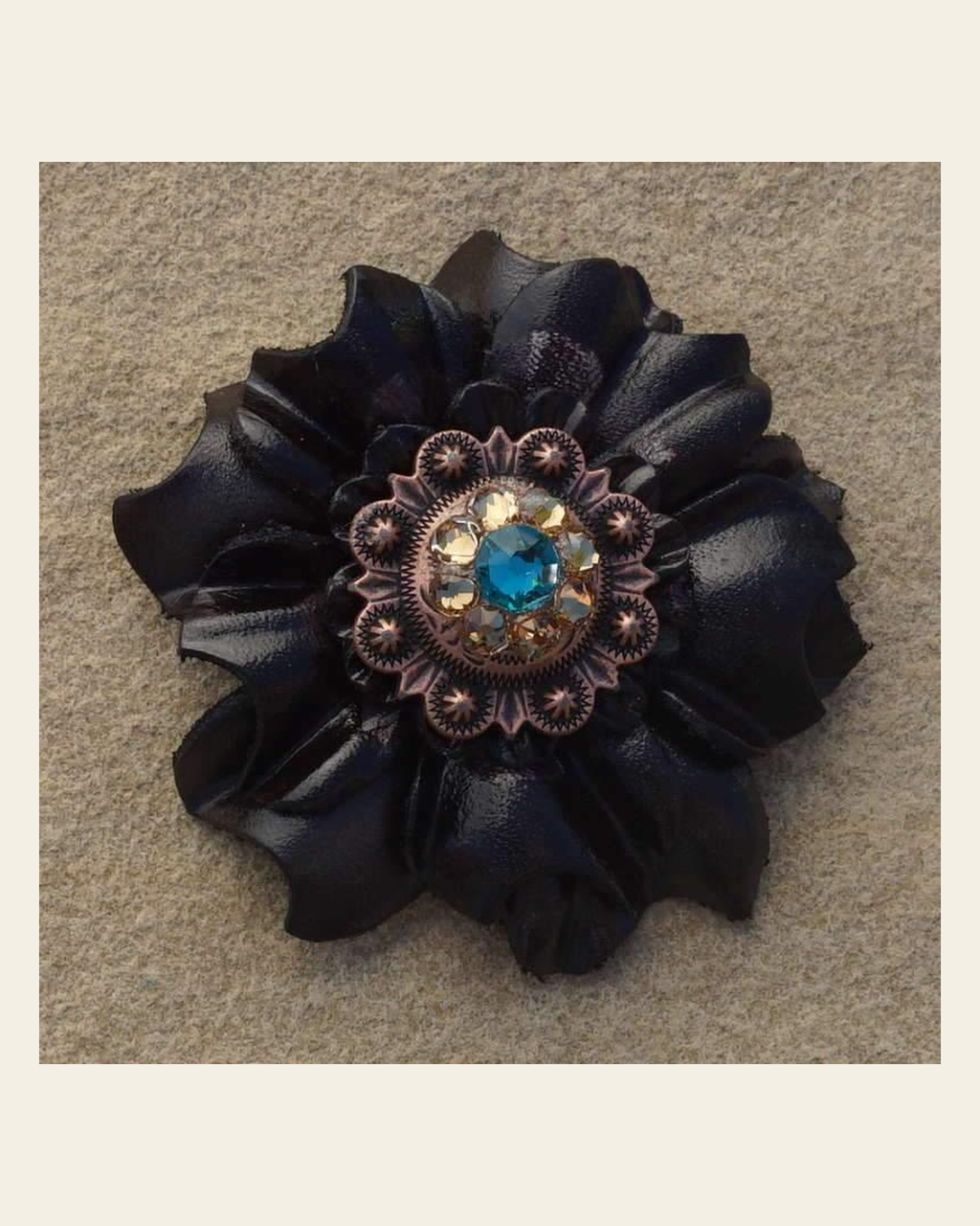 Black Carnation Flower With Copper Teal & Champagne 1" Concho on a warm cream background