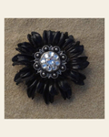 Black Daisy Flower With Antique Silver Clear 1" Concho on a warm cream background