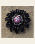 Black Daisy Flower With Antique Silver Pink and AB 1" Concho on a warm cream background
